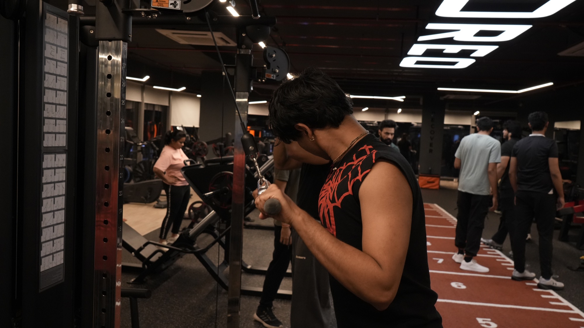 COREO member building work capacity with a cable exercise
